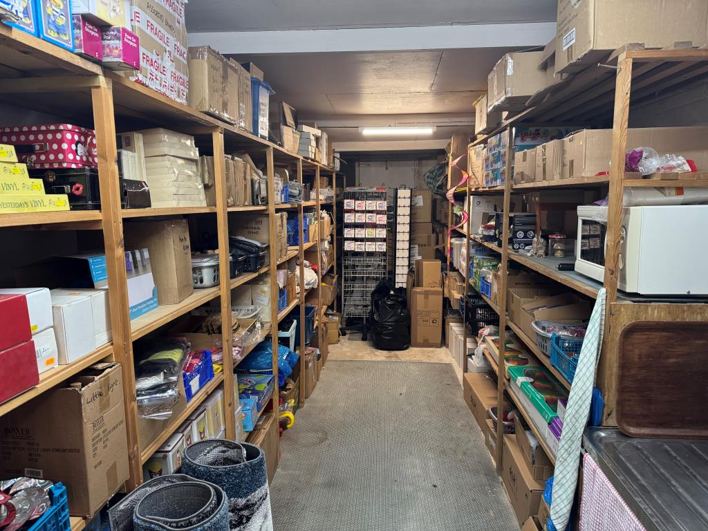 Lot: 94 - DOUBLE-FRONTED HIGH STREET SHOP WITH LARGE REAR STORES WITH POTENTIAL AND FREEHOLD INTEREST IN TWO FLATS OVER - Rear storage room